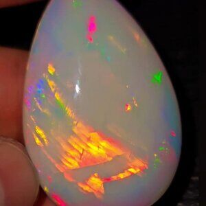 70 Carat -Natural Ethiopian Opal Pear Cabochon Rare Collction.